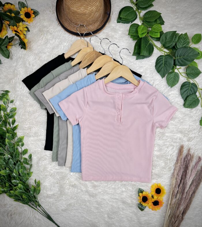 REMERA BOTONES ss26 - Imagen 4