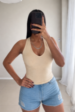 TOP ESCOTE V LYCRA ss26